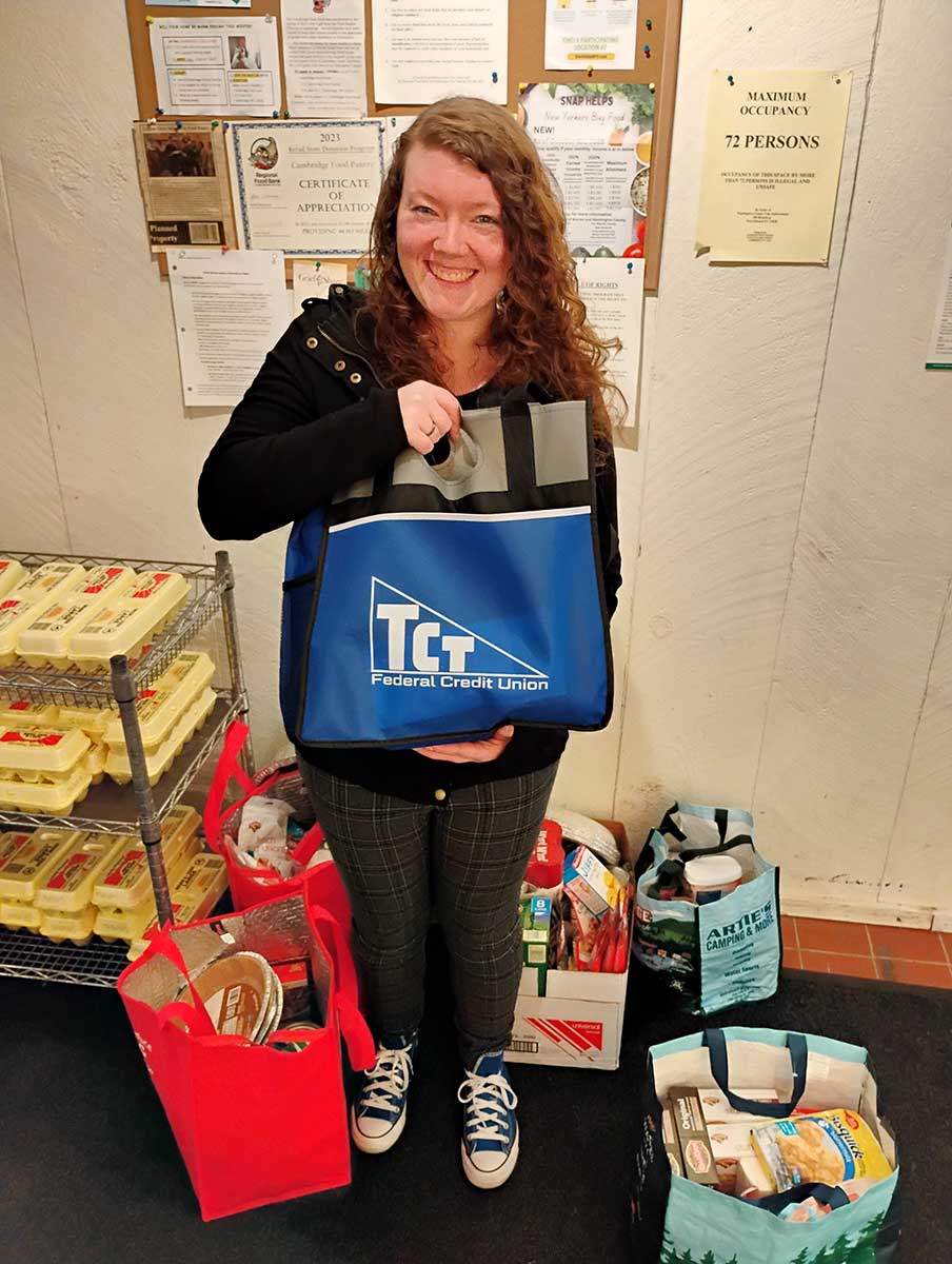 TCT's Alexis donates Thanksgiving baskets to Cambridge Food Pantry